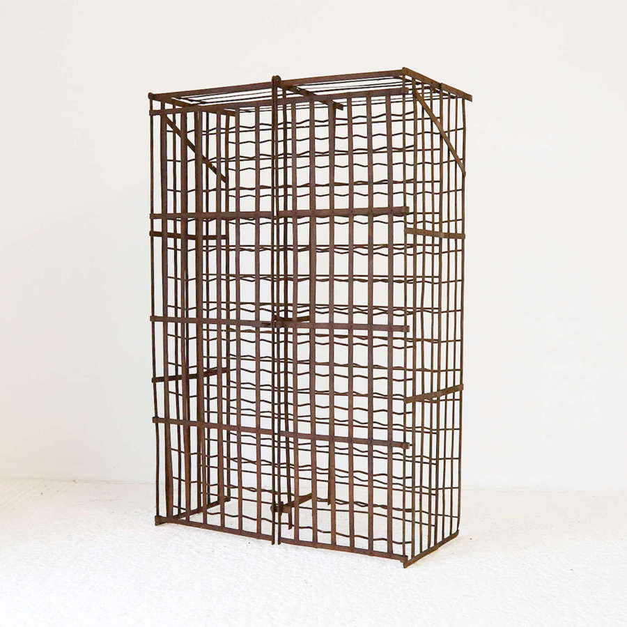 Early 20thC wrought iron lockable wine cage  280 bottle capacity