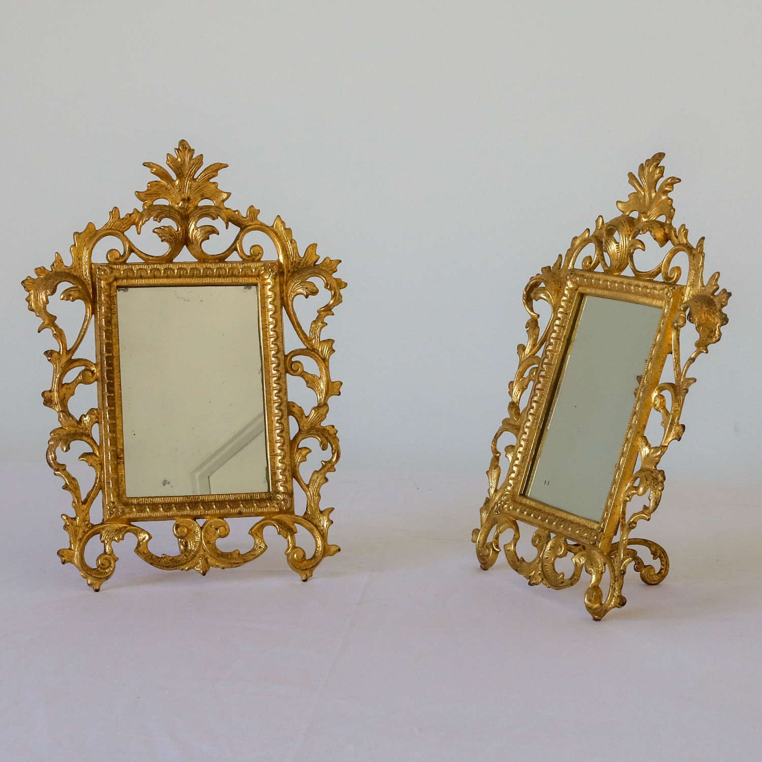Pair of French circa1880 gilt metal table mirrors