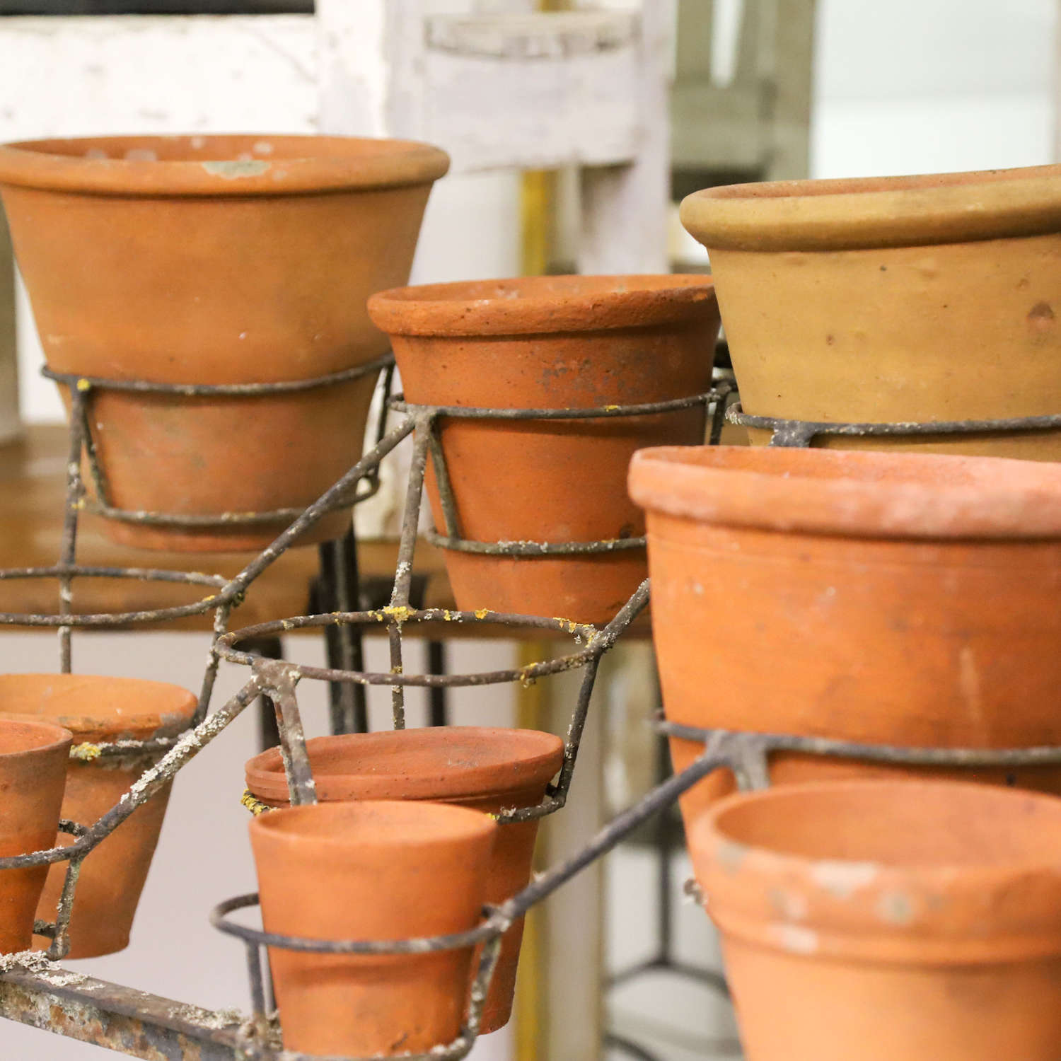 21 various sized old terracotta plant pots sold as a set