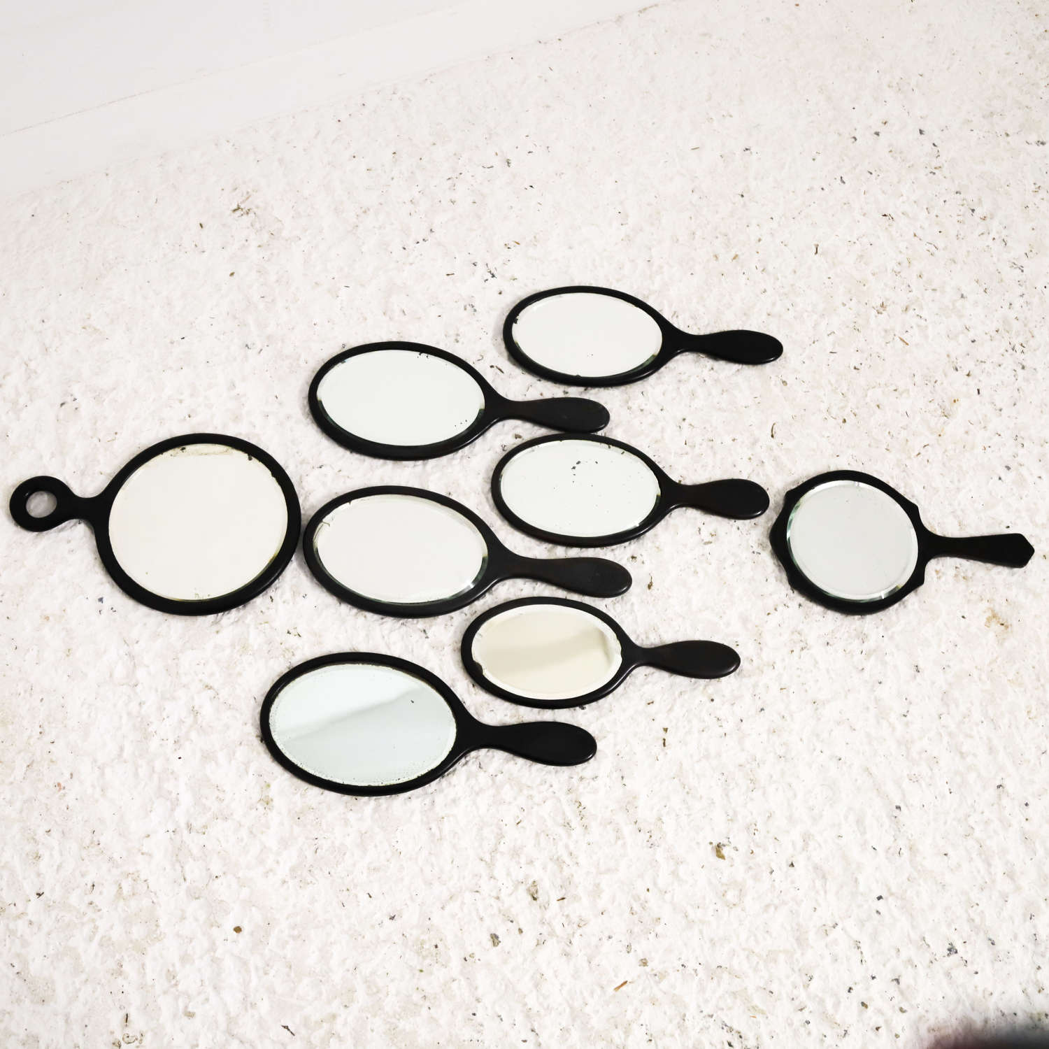 Late 19th/Early 20th Century Collection of 8 Ebony Hand Mirrors